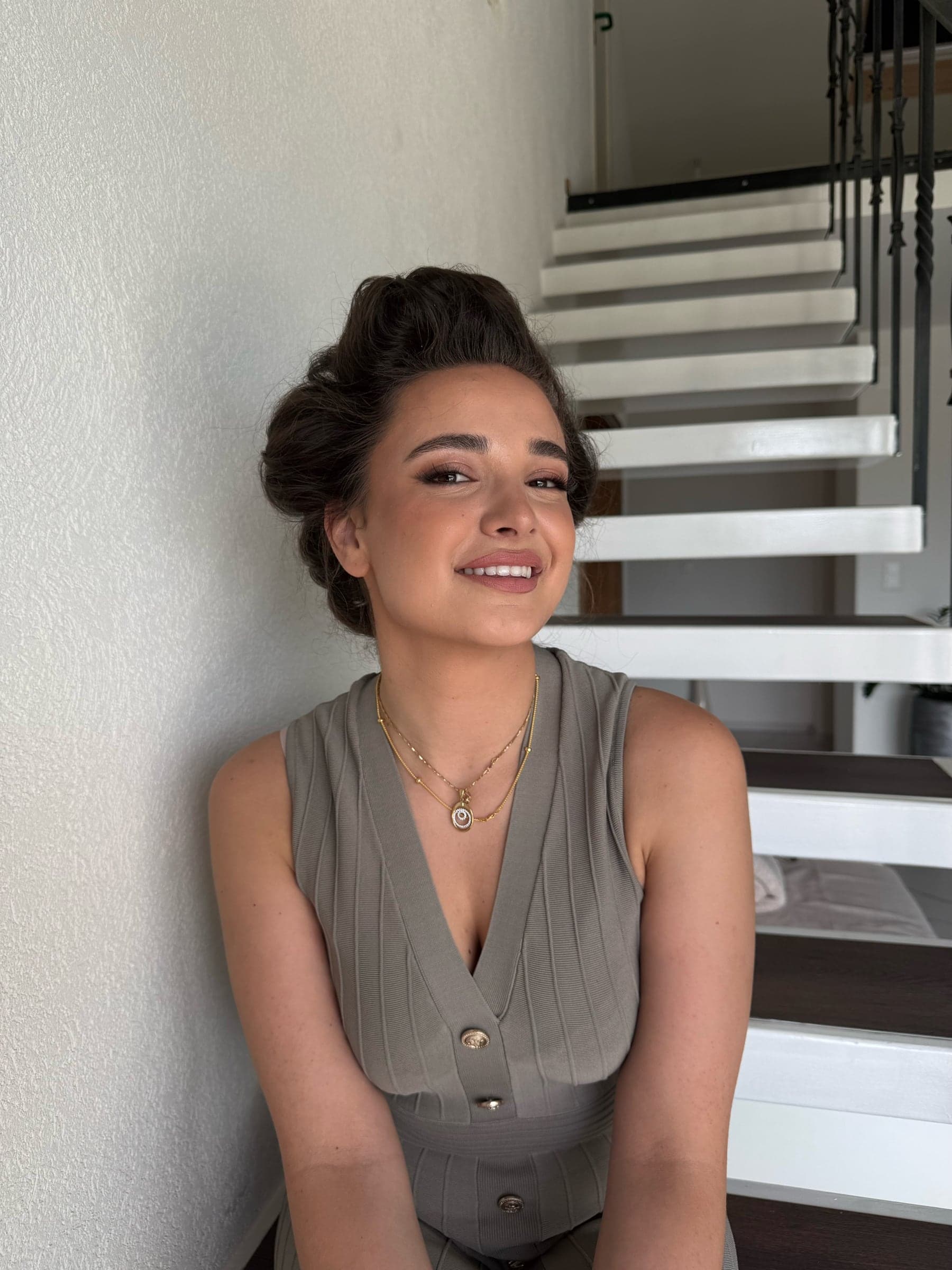 Soft glam make-up client with warm neutral finish